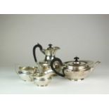 A four piece silver tea service