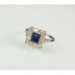 A sapphire and diamond cluster ring