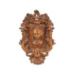 Thomas Henry Kendall: a carved oak cartouche containing a veiled maiden