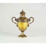 A Victorian silver gilt two-handled cup and cover of urn form