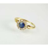 A late 19th century sapphire and diamond cluster ring