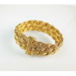 A 14ct gold stylised plait bracelet