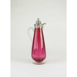 A Victorian silver mounted cranberry glass claret jug