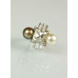 An impressive 18ct white gold diamond and natural pearl ring