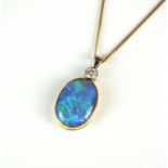 A black opal and diamond pendant