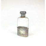 An Edwardian silver mounted glass hip flask