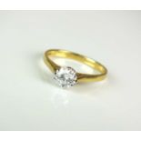 An 18ct gold single stone diamond ring