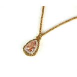 An 18ct gold topaz and diamond necklace
