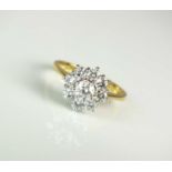 An 18ct gold diamond floral cluster ring