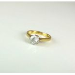 An 18ct gold single stone diamond ring