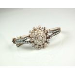 A late 19th century diamond bangle/pendant