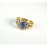 A sapphire & diamond cluster ring