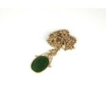 A 9ct gold belcher link chain with jade pendant