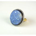 An Egyptian lapis lazuli and diamond ring