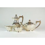 A four piece silver tea service