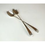 A pair of George III Old English pattern silver basting spoons