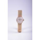 Omega: A lady's 9ct gold bracelet manual wind wristwatch