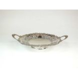 A large two handled silver dish