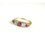 A graduated five stone pink sapphire and diamond ring