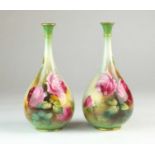 A pair of Royal Worcester Hadley ware vases, dated 1907