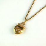 A late 19th/early 20th century seed pearl heart shaped pendant on chain