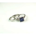 An Art Deco single stone sapphire ring and a wedding band