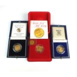 Three half sovereigns and an Isle of Man angel