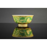 A Chinese green and yellow glazed anhua 'dragon' bowl, Guangxu mark