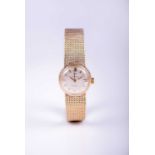 Omega: A lady's 9ct gold Ladymatic bracelet wristwatch