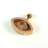 An 18ct gold Chopard 'Happy Diamonds' Evil Eye pendant