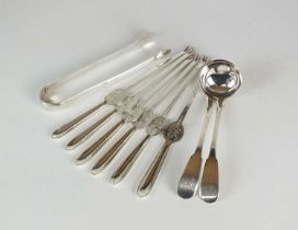 A set of six silver lobster picks, two silver sauce ladles and a pair of silver sugar tongs