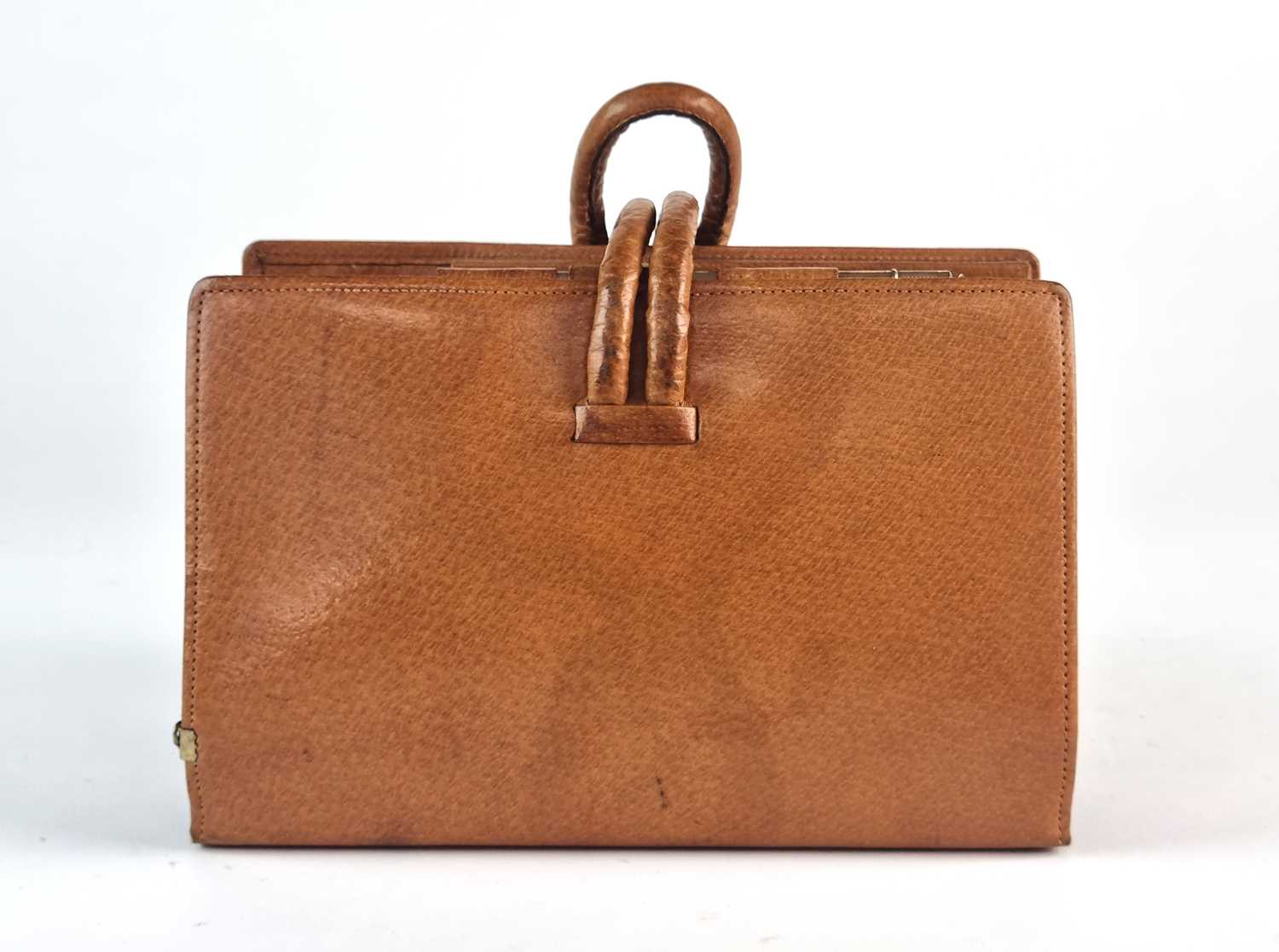 A Swaine-Brigg pigskin racing clutch bag