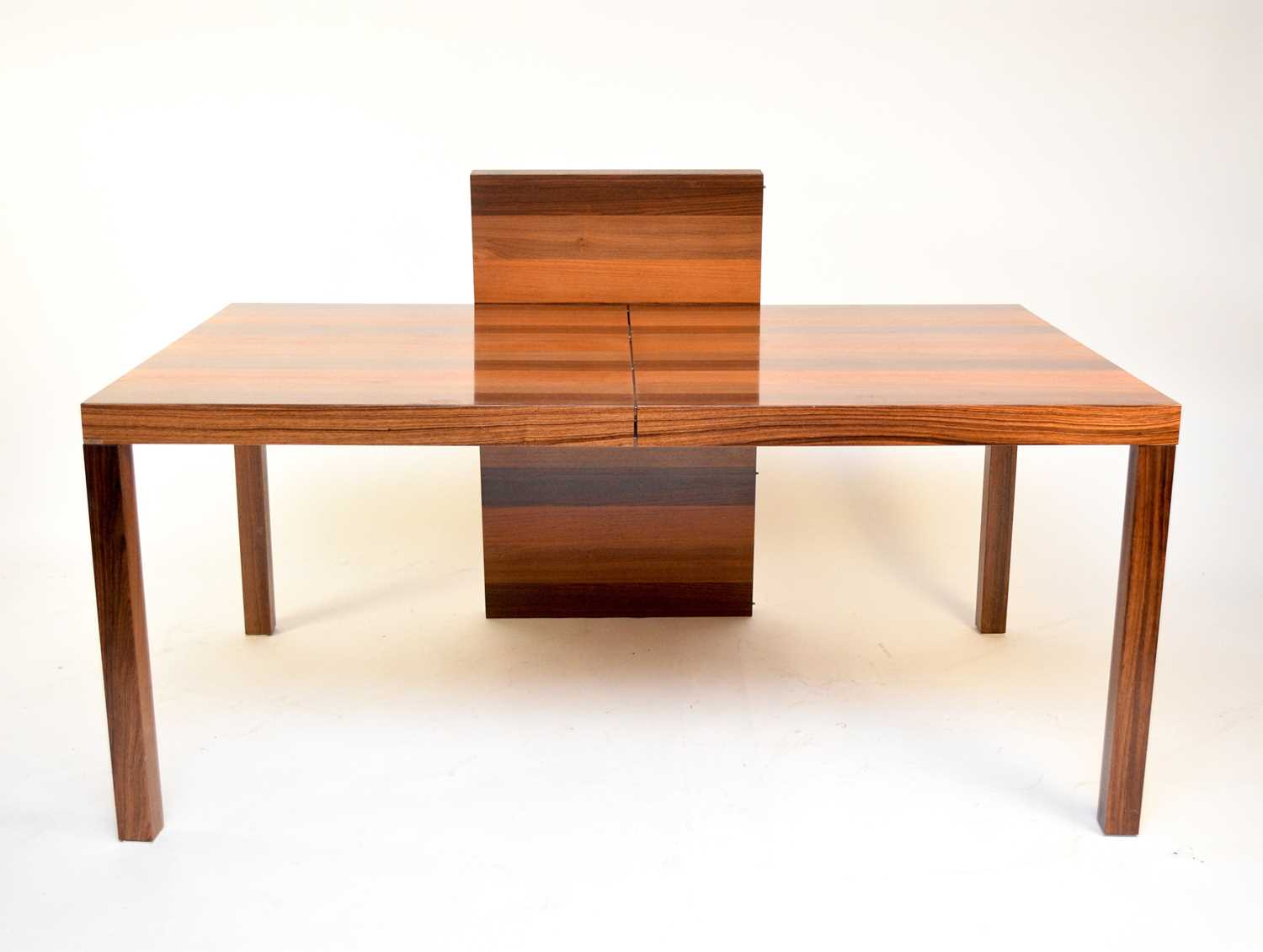 A Tri-wood Dyrlund 'Parsons' Dining table and 8 dining chairs