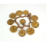 A 9ct rose gold curb link bracelet with attached coins