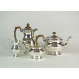 A four piece silver tea service