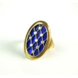 An 18ct gold blue enamel and diamond ring