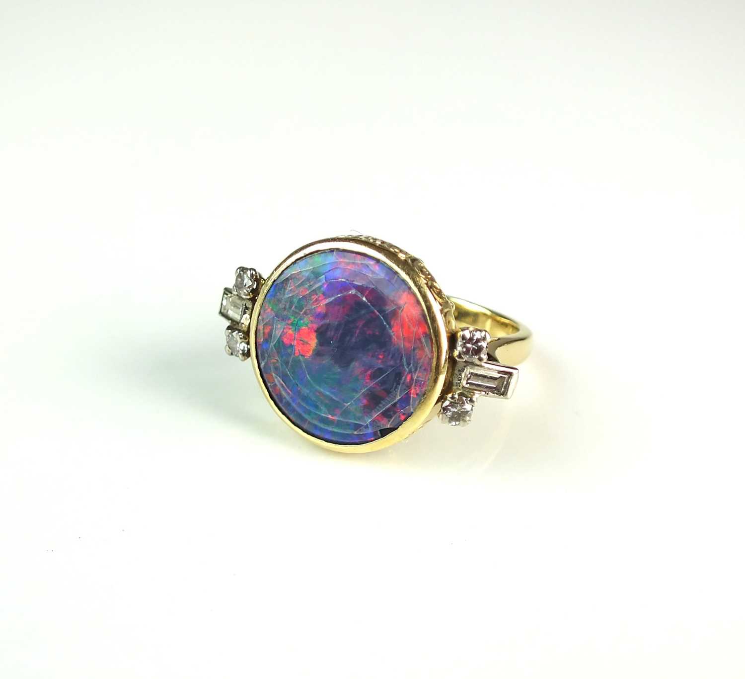 An opal doublet ring and diamond ring