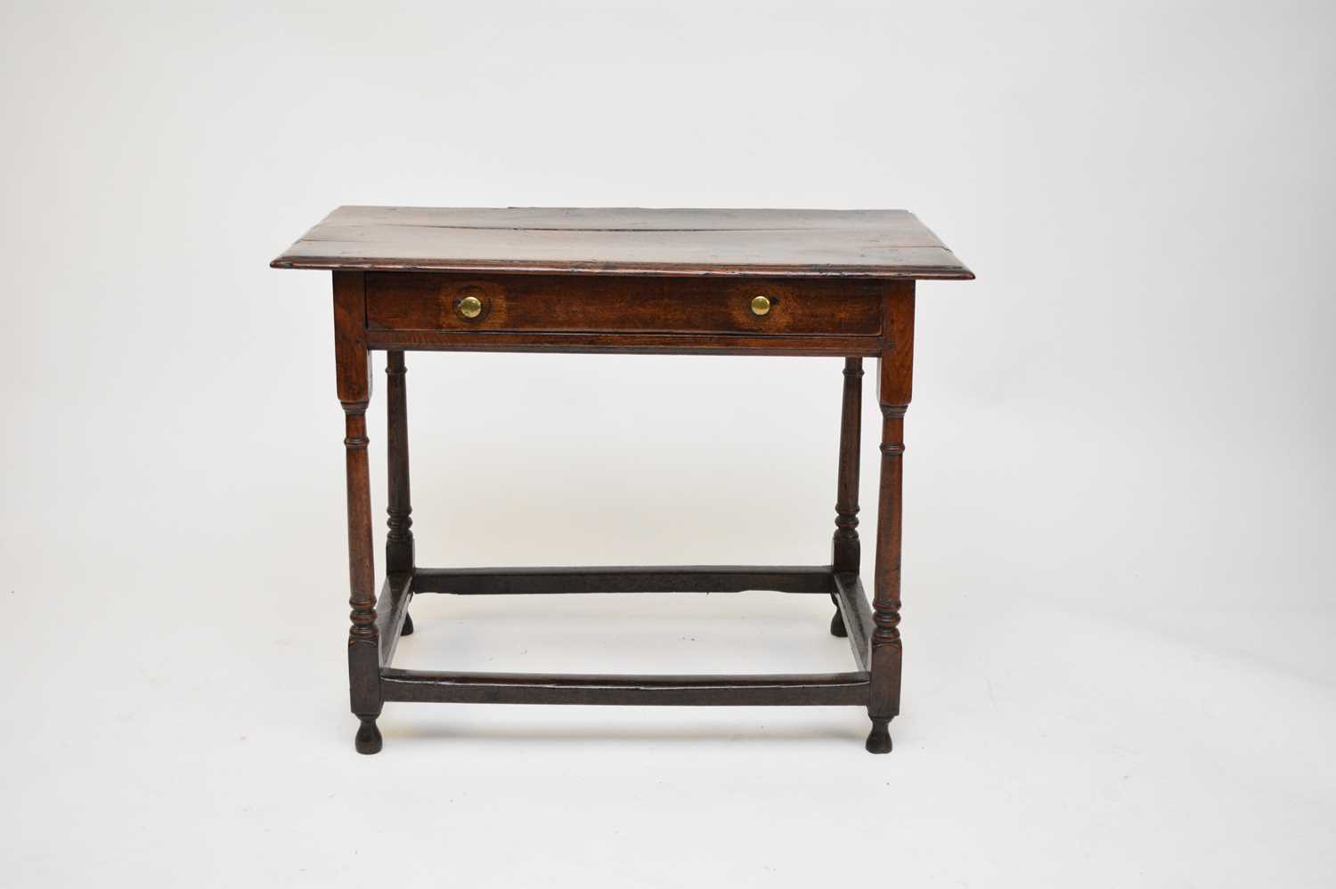 A late 17th century/early 18th century oak side table