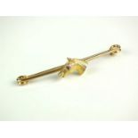 A yellow metal horse head bar brooch/stock pin,