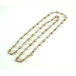 A tri-coloured 9ct gold bead chain necklace