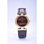 Baume & Mercier: A lady's 18ct gold Classic wristwatch