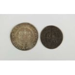 An Edward VI silver shilling and an Elizabeth I silver sixpence