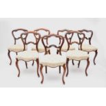 A harlequin set of seven 19th century rosewood dining chairs