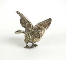 A silver model of a chick