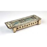 An early 19th century carved bone POW dominoes box