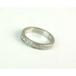 A diamond half eternity ring