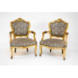 A set of 4 Continental, Louis XV style gilded armchairs