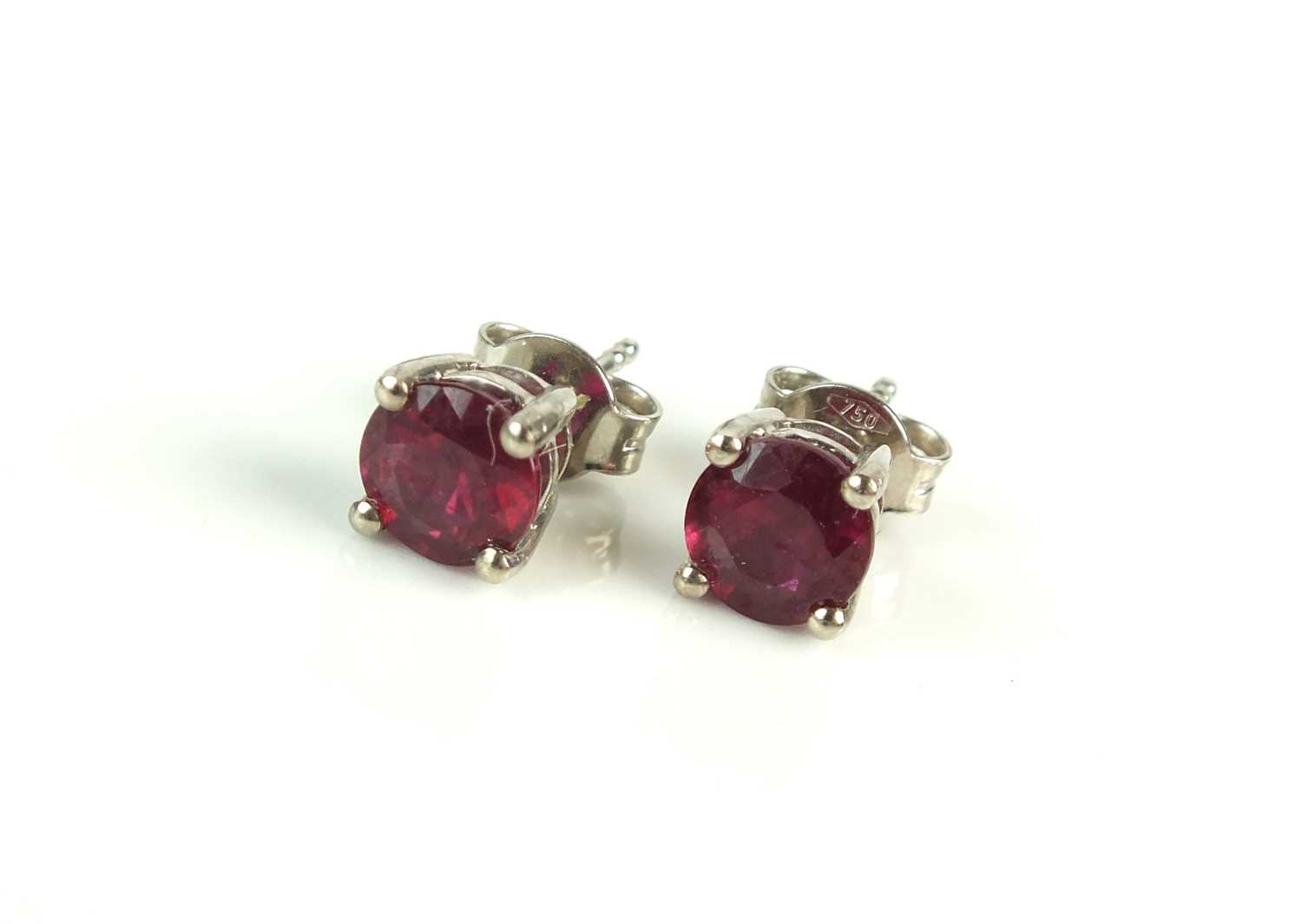 A pair of ruby and earrings