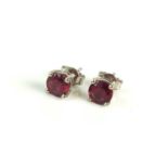A pair of ruby and earrings