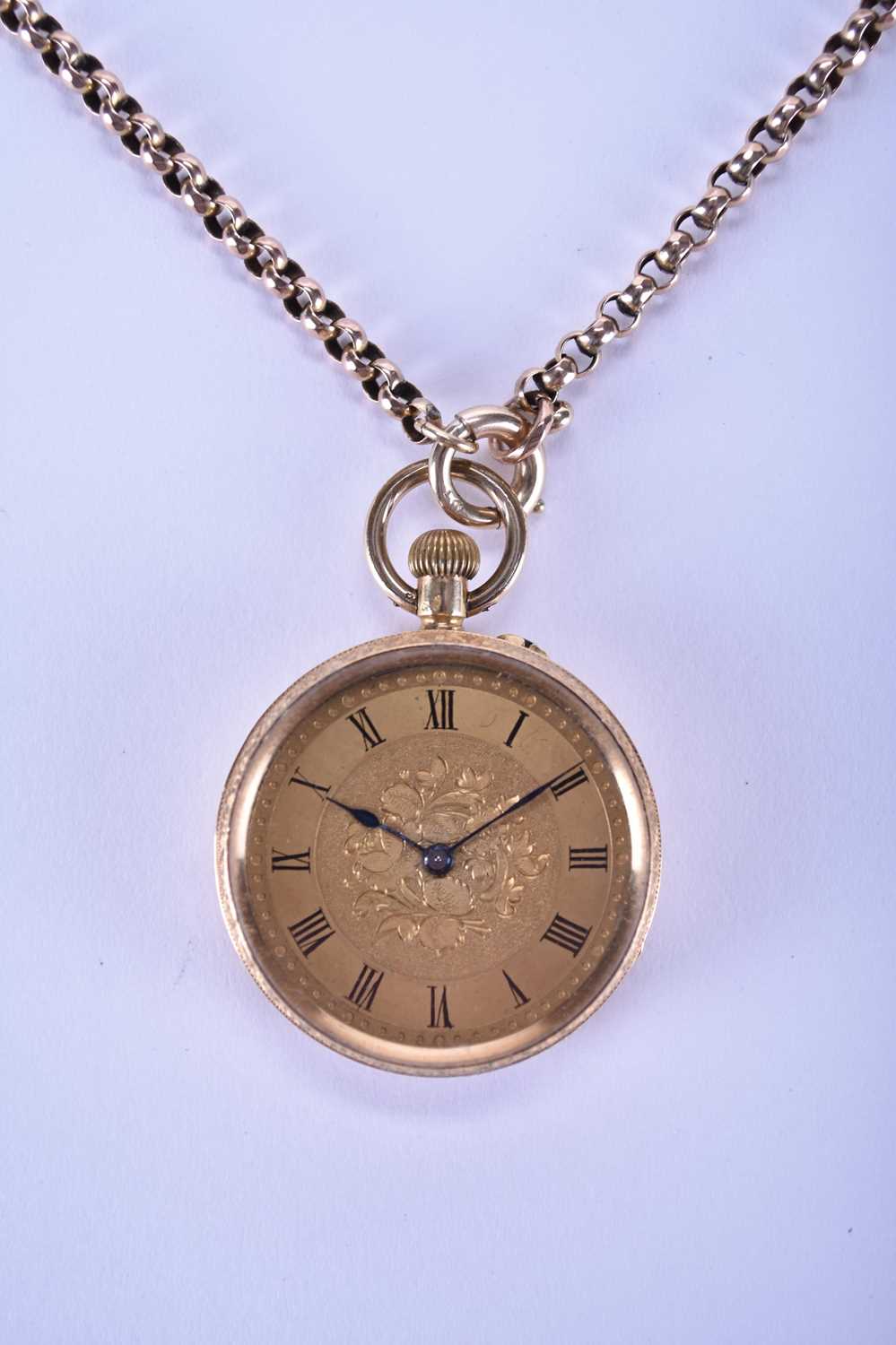 A lady's 18ct gold open face pocket watch with an associated chain